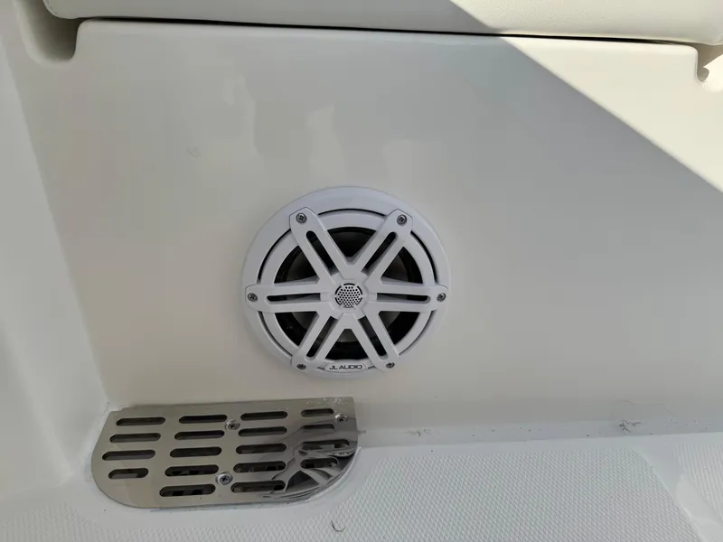 Slide: The Image of 2025 Regulator 26XO boat speaker and vent detail. - 30