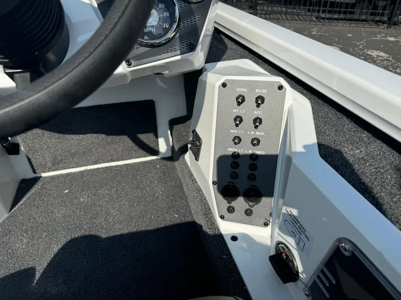 Slide: The Image of 2025 Vexus AVX 1880 boat dashboard with control panel and gauges. - 13