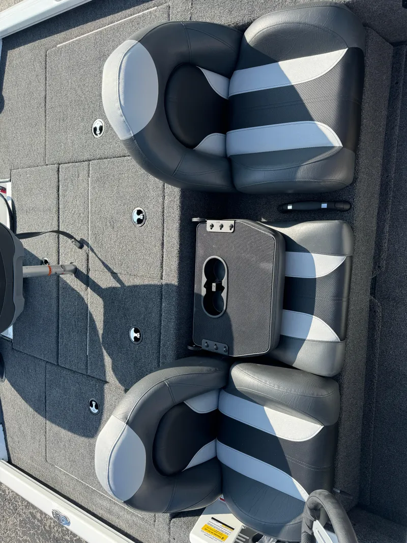 Slide: The Image of 2025 Vexus AVX 1880 boat interior with dual black and white seats. - 19