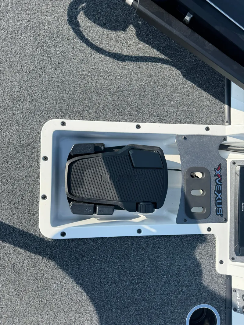 Slide: The Image of 2025 Vexus AVX 1880 boat foot pedal on textured deck. - 31