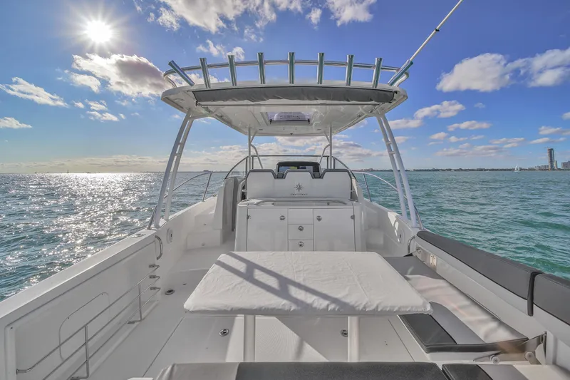 Slide: The Image of 2019 Jeanneau 34 boat on open water under sunny sky. - 17