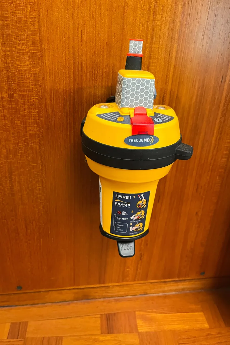 Slide: The Image of Yellow emergency beacon mounted on wooden panel of 2003 Dettling 51 Express Cruiser. - 33