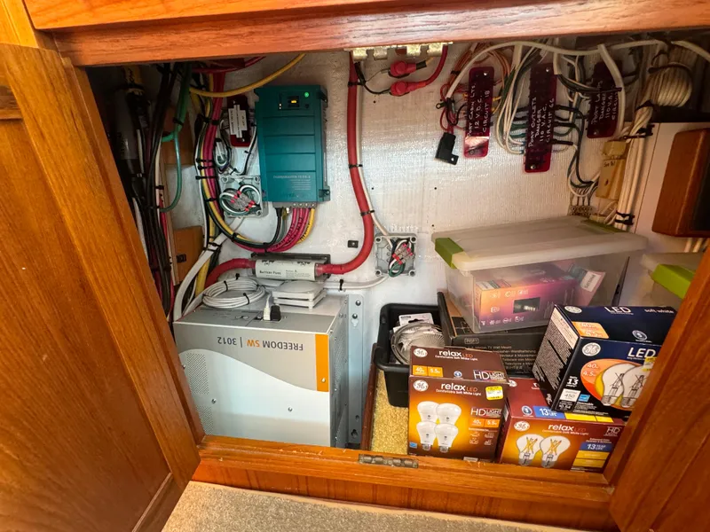 Slide: The Image of Electrical compartment of 2003 Dettling 51 Express Cruiser with wiring and LED bulb boxes. - 40