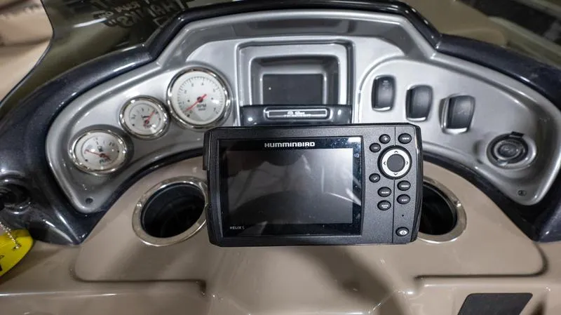 Slide: The Image of 2021 Sun Tracker Party Barge 20 DLX dashboard with Humminbird fish finder and gauges. - 10