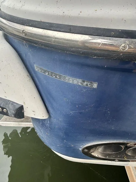 Slide: The Image of 2003 Crownline 270 BR boat hull with visible identification number. - 13