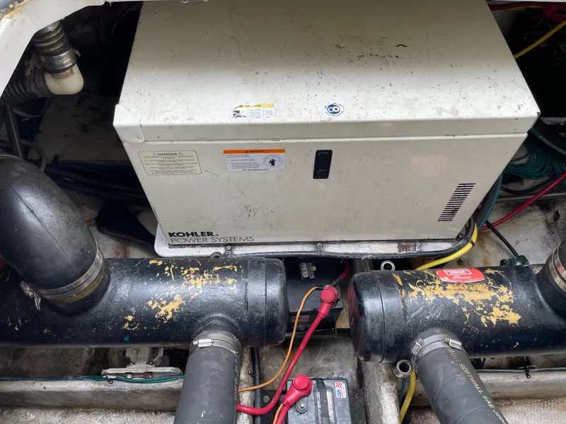 Slide: The Image of Engine compartment of a 2007 Silverton 330 Sport Bridge with Kohler generator. - 20