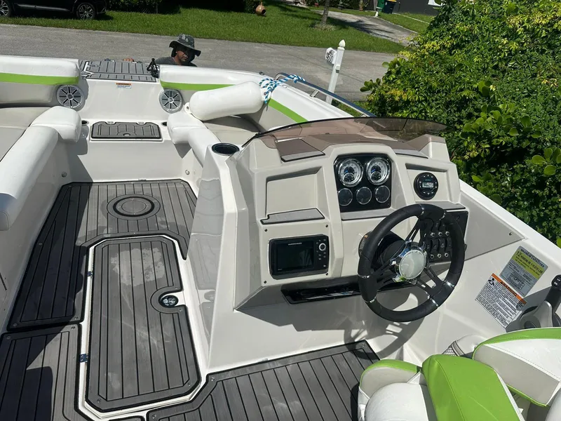 Slide: The Image of 2022 Starcraft SVX 191 OB boat interior with modern dashboard and seating. - 20