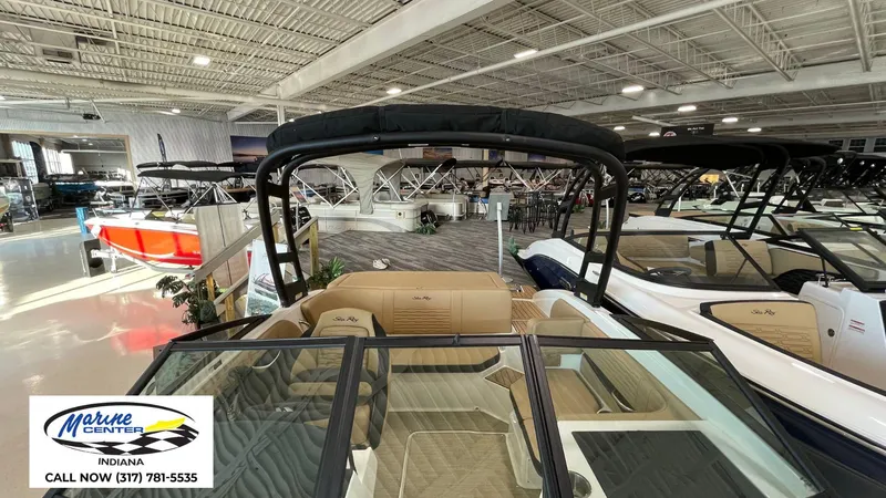 Slide: The Image of 2023 Sea Ray SPX 190 boat displayed in showroom, Marine Center Indiana. - 12