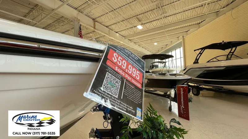 Slide: The Image of 2023 Sea Ray SPX 190 boat on display with price tag at Indiana Marine Center. - 14