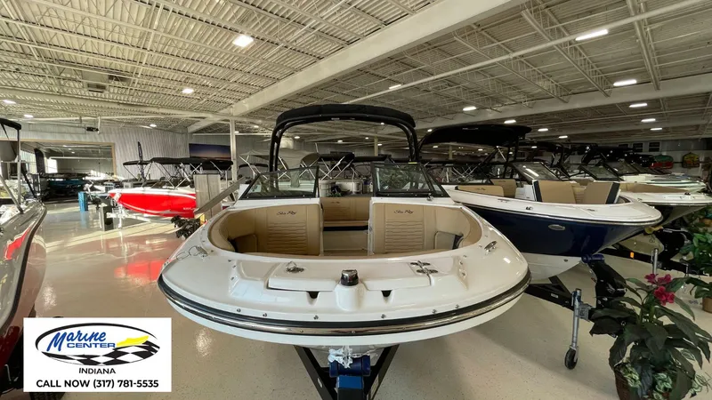 Slide: The Image of 2023 Sea Ray SPX 190 boat displayed in showroom, Marine Center Indiana. - 15