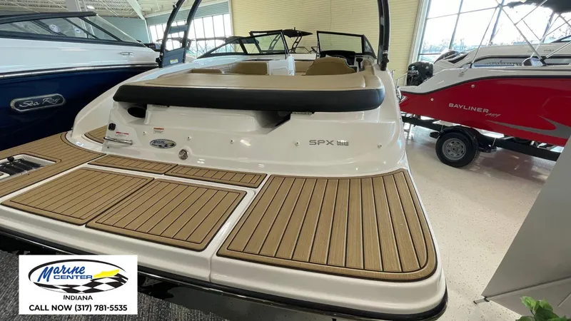 Slide: The Image of 2023 Sea Ray SPX 190 boat displayed at Marine Center Indiana showroom. - 16