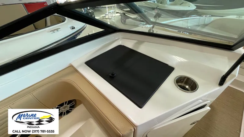 Slide: The Image of Interior view of 2023 Sea Ray SPX 190 boat with seating and console details. - 9