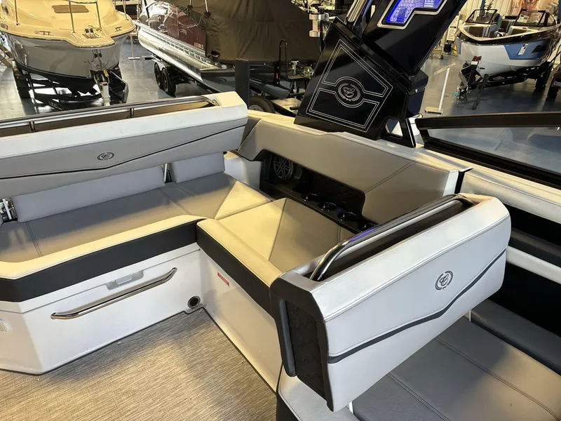 Slide: The Image of 2025 Cobalt R4 Surf boat interior with sleek seating and modern design. - 14