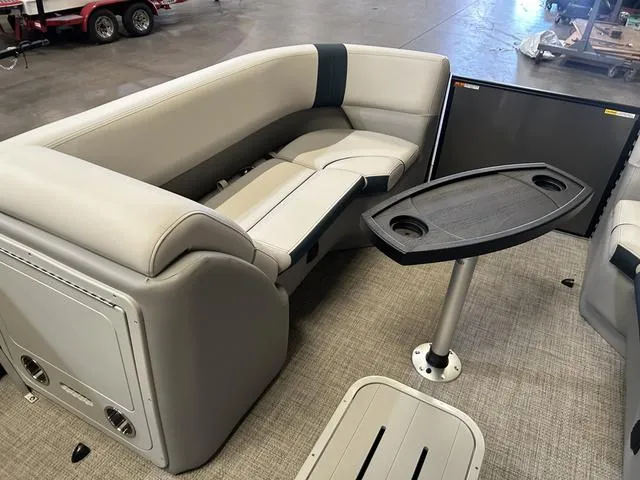 Slide: The Image of 2025 G3 Suncatcher Select 322SS boat interior with Yamaha 250HP, featuring helm and captain's chair. - 12
