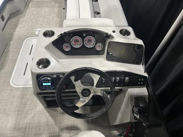 Slide: The Image of 2025 G3 SunCatcher Select 322SS boat interior with Yamaha 200HP engine, luxurious seating. - 27