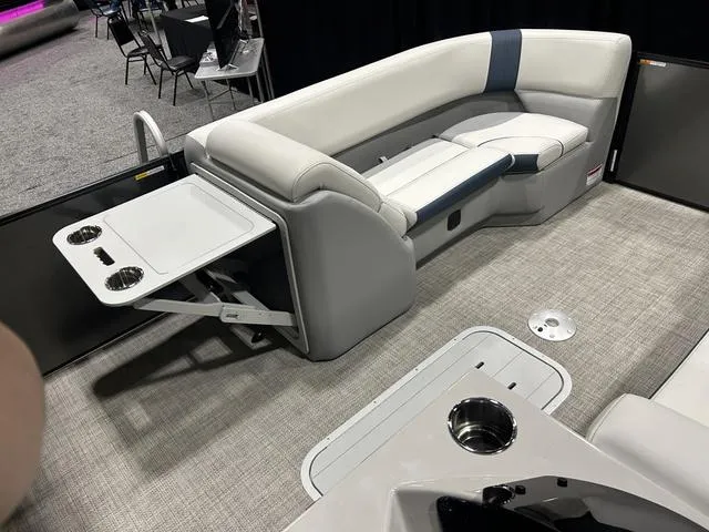 Slide: The Image of 2025 G3 SunCatcher Select 322SS interior with Yamaha 200HP, featuring luxurious seating and modern controls. - 28