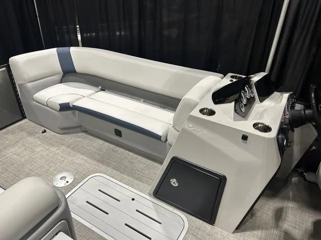 Slide: The Image of 2025 G3 SunCatcher Select 322SS boat interior with Yamaha 200HP, featuring luxurious seating. - 29