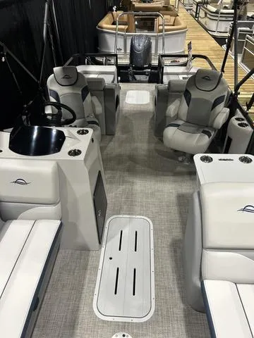 Slide: The Image of 2025 G3 SunCatcher Select 322SS boat interior with Yamaha 200HP, featuring modern helm and seating. - 30