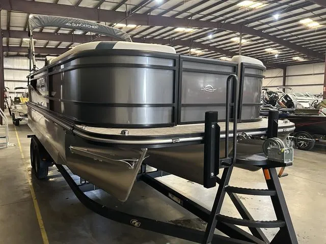 Slide: The Image of 2025 G3 Suncatcher Select 322SS boat with Yamaha 250HP engine in warehouse. - 4