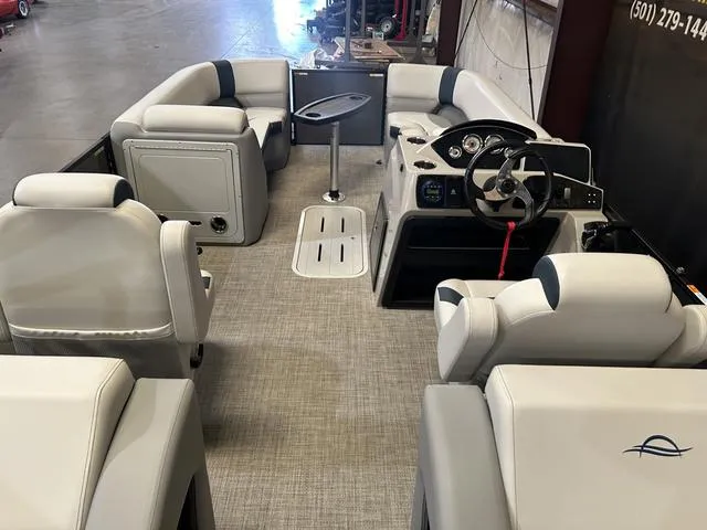 Slide: The Image of 2025 G3 Suncatcher Select 322SS boat emblem detail. - 7