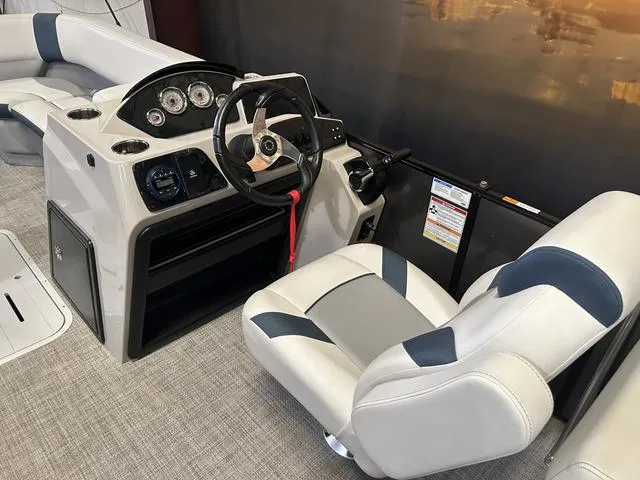 Slide: The Image of 2025 G3 Suncatcher Select 322SS boat interior with Yamaha 250HP engine, featuring plush seating. - 8
