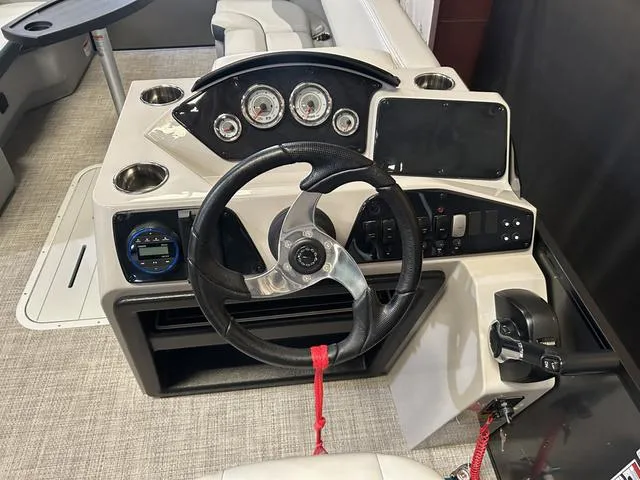 Slide: The Image of 2025 G3 Suncatcher Select 322SS boat interior with Yamaha 250HP engine, spacious seating. - 9