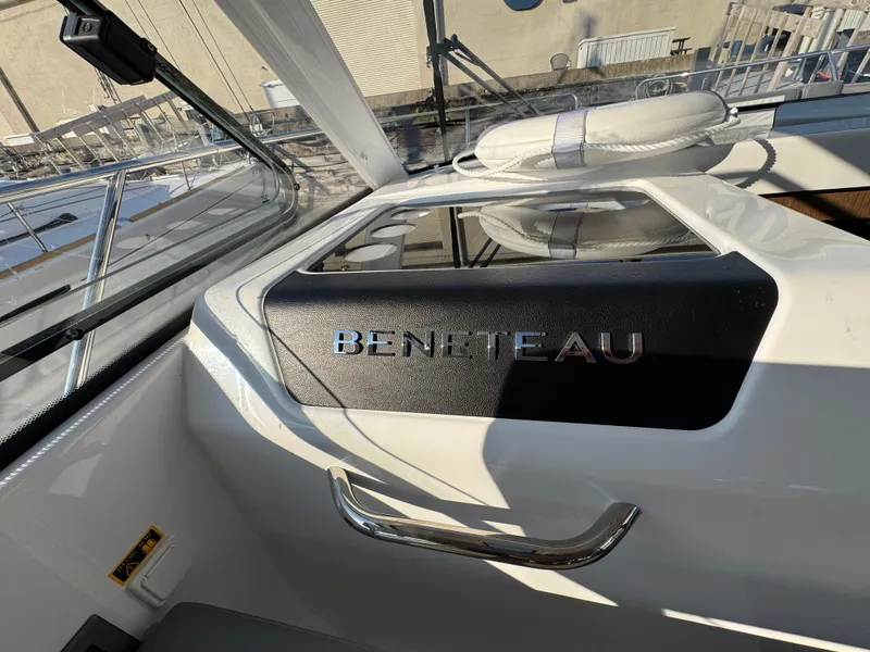 Slide: The Image of 2023 Beneteau Antares 9 boat interior with logo and sleek design. - 37