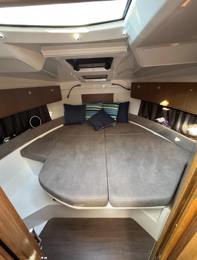 Slide: The Image of 2023 Beneteau Antares 9 cabin interior with cozy bed and modern design. - 48