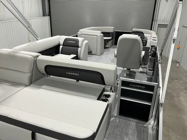 Slide: The Image of 2025 Harris Cruiser 210 SL pontoon boat interior with modern seating and sleek design. - 12