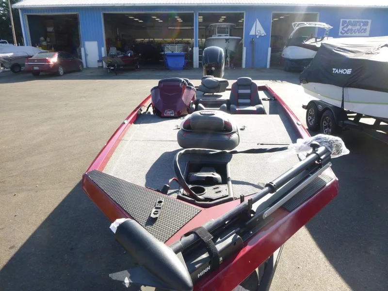 Slide: The Image of 2024 Ranger RT188 boat in a marina, featuring a sleek red design and modern equipment. - 4