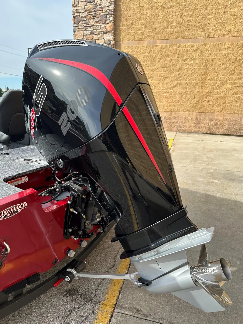 Slide: The Image of 2025 Tracker Targa V-18 Combo boat with powerful outboard motor. - 2