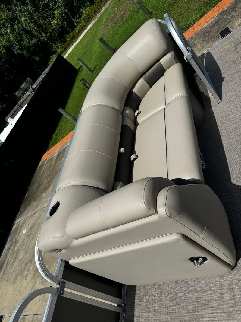 Slide: The Image of 2023 Sun Tracker Party Barge 22 DLX with beige seating on deck. - 21