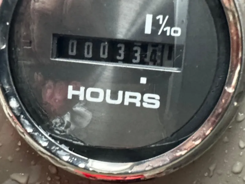 Slide: The Image of Hour meter showing 334.1 hours on 2023 Sun Tracker Party Barge 22 DLX. - 8