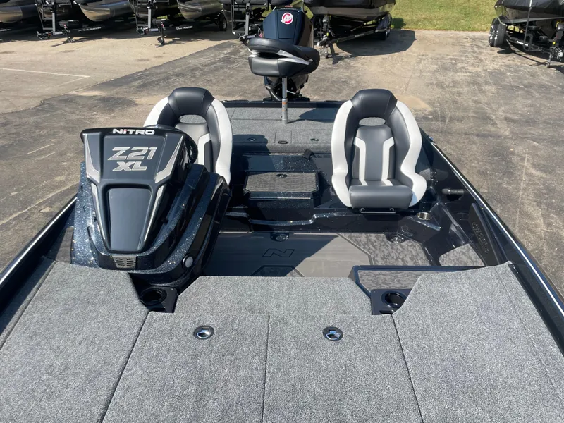 Slide: The Image of 2025 Nitro Z21 XL Pro boat interior with dual seats and sleek design. - 11