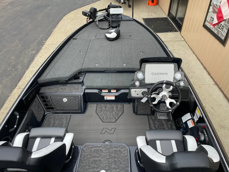 Slide: The Image of 2025 Nitro Z21 XL Pro boat interior with Garmin system and dual seating. - 6