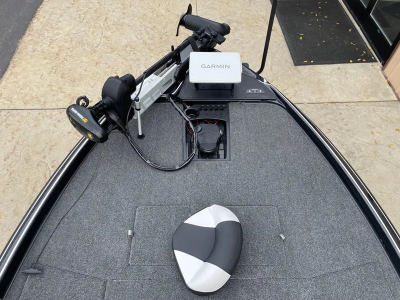 Slide: The Image of 2025 Nitro Z21 XL Pro boat deck with Garmin equipment and trolling motor. - 7