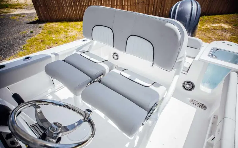 Slide: The Image of 2021 Sea Fox 248 Commander boat interior with dual helm seats and steering wheel. - 11