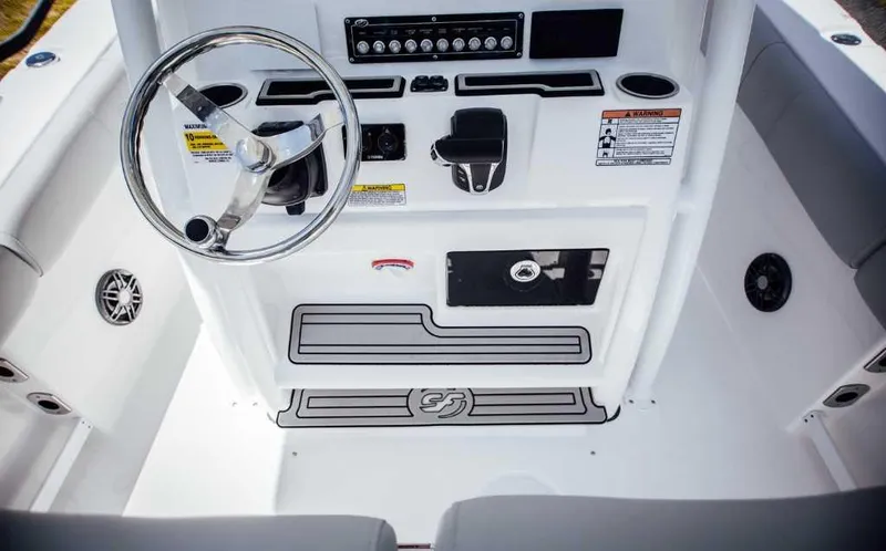 Slide: The Image of 2021 Sea Fox 248 Commander boat console with steering wheel and controls. - 14