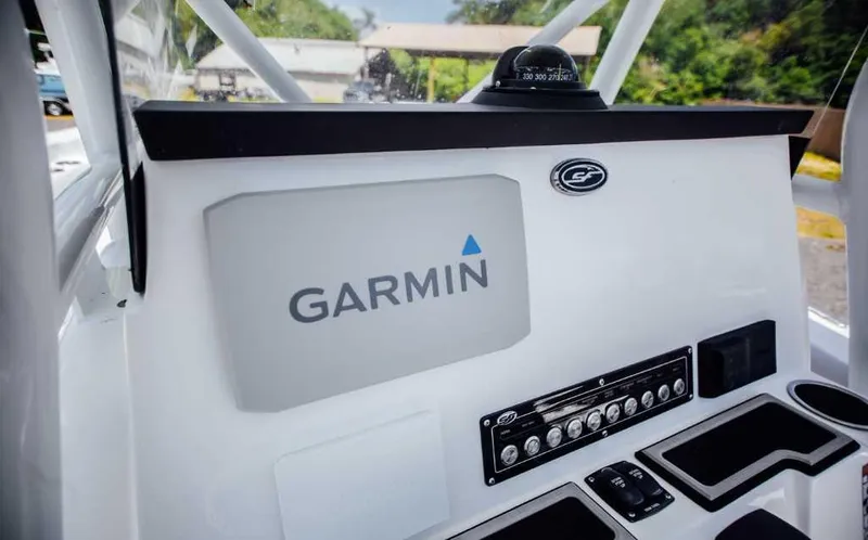 Slide: The Image of 2021 Sea Fox 248 Commander dashboard featuring Garmin navigation system. - 17