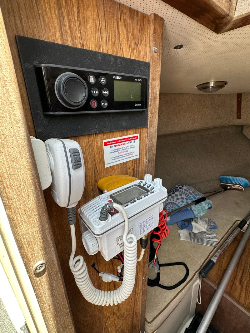 Slide: The Image of Interior of 1987 Mako 228 boat with radio and equipment. - 31