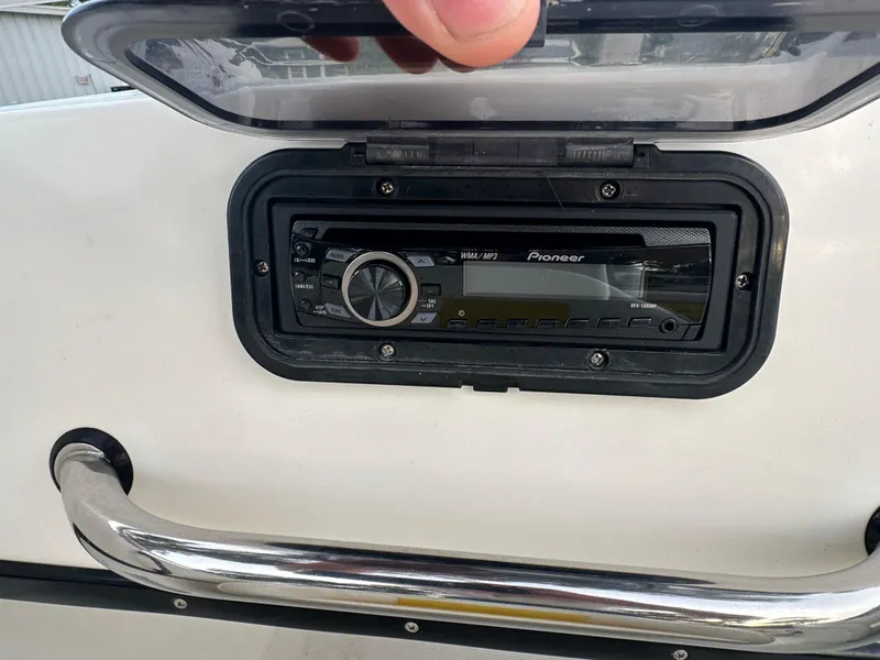 Slide: The Image of Pioneer stereo system in 1990 Superboat 21 dashboard. - 23