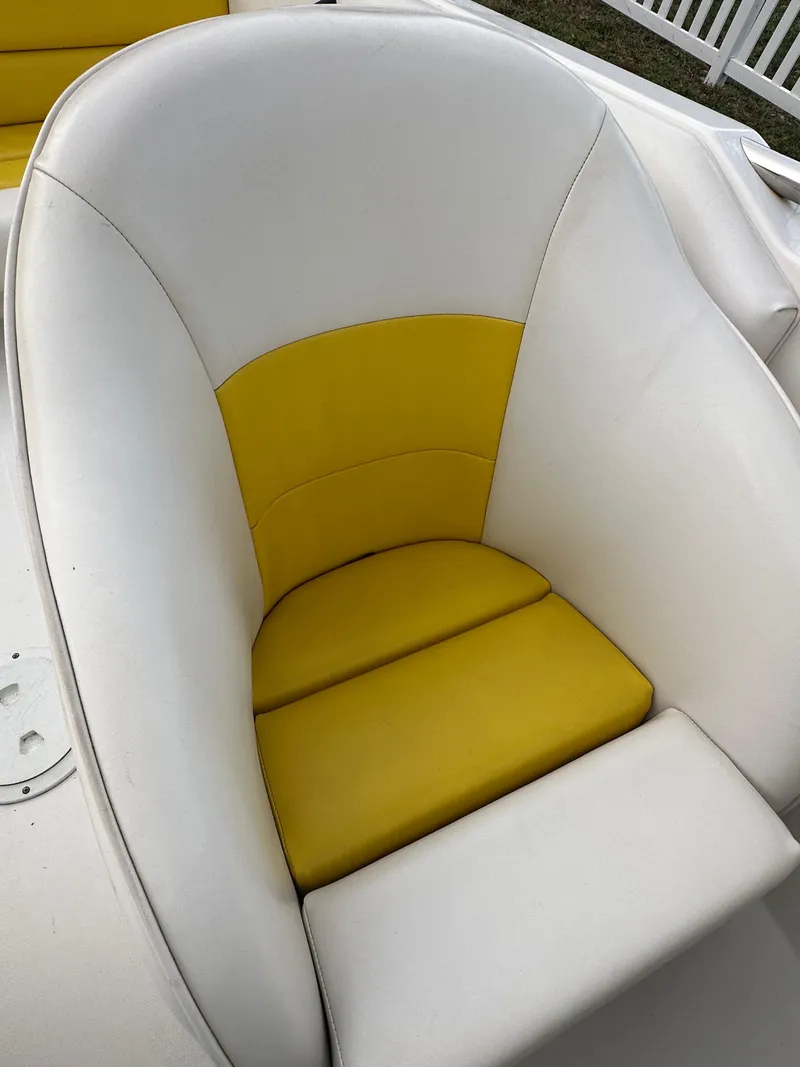 Slide: The Image of White and yellow seat in 1990 Superboat 21. - 29
