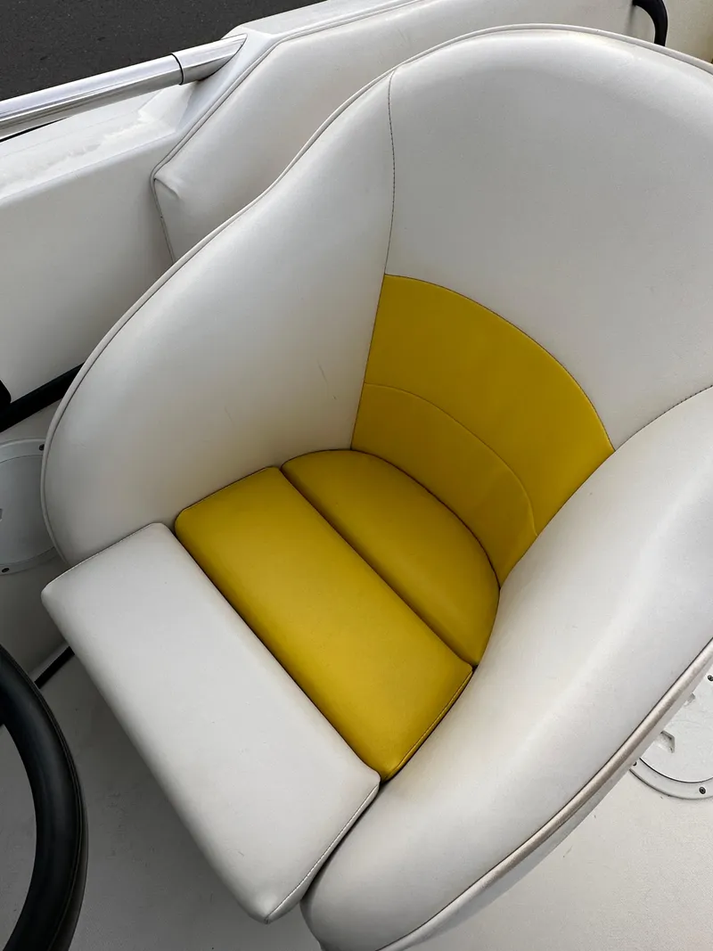 Slide: The Image of White and yellow seat in 1990 Superboat 21. - 30