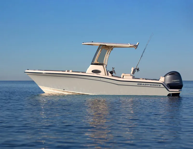 Slide: The Image of 2025 Grady-White 216 boat on calm water, featuring sleek design and modern amenities. - 1