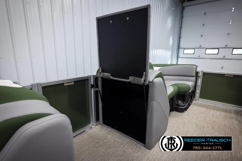 Slide: The Image of 2025 Avalon LSZ CRB interior with green and gray seating in a garage setting. - 21