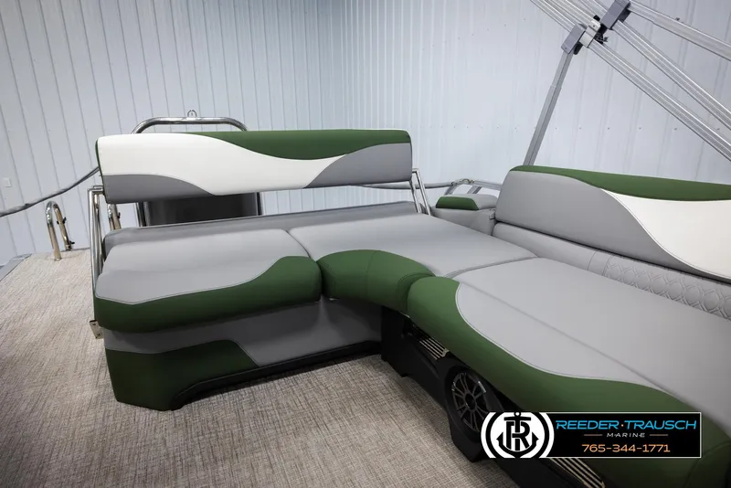 Slide: The Image of Avalon LSZ CRB 2025 boat interior with green and gray seating. - 24