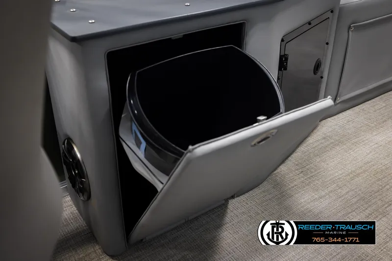 Slide: The Image of 2025 Avalon LSZ CRB boat storage compartment with open hatch, showcasing interior space. - 28