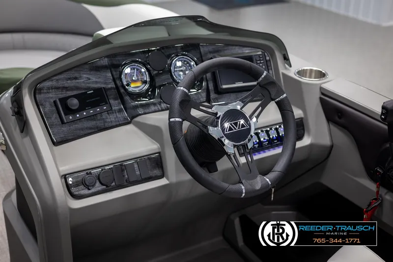 Slide: The Image of 2025 Avalon LSZ CRB boat dashboard with steering wheel and control panel. - 30