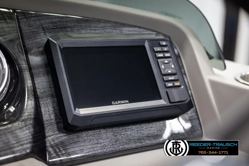 Slide: The Image of Garmin display on 2025 Avalon LSZ CRB dashboard, Reeder-Trausch Marine branding. - 34