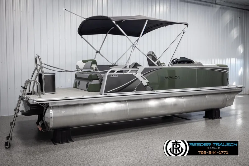 Slide: The Image of 2025 Avalon LSZ CRB pontoon boat with canopy in showroom. - 6